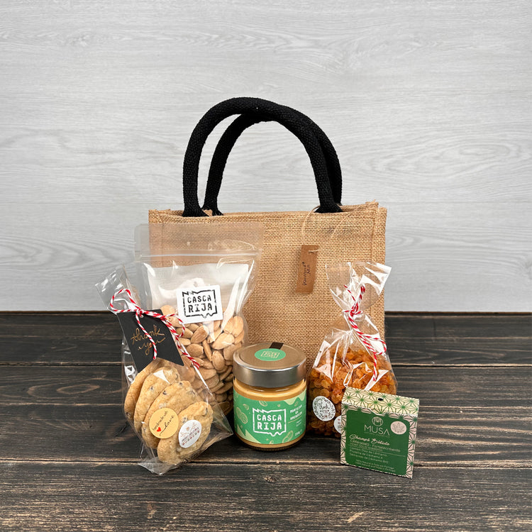 Cabaz S com saco kraft e vários produtos alimentares embalados