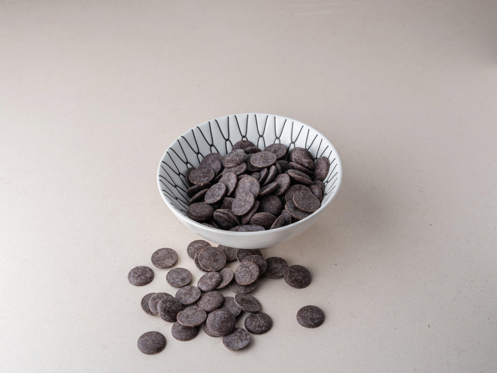 
                  
                    Chocolate Negro em Medalhas (70% cacau) - Casca Rija
                  
                